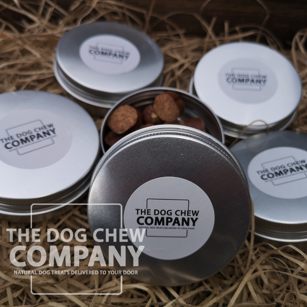 A group of dog treat tins which are supplied with some of the dog treat and chew boxes. The Dog Chew Company dog treat tin is aluminium and has a screw lid. The dod treat tin can be kept in your pocket for walks and training. It arrives filled with treats